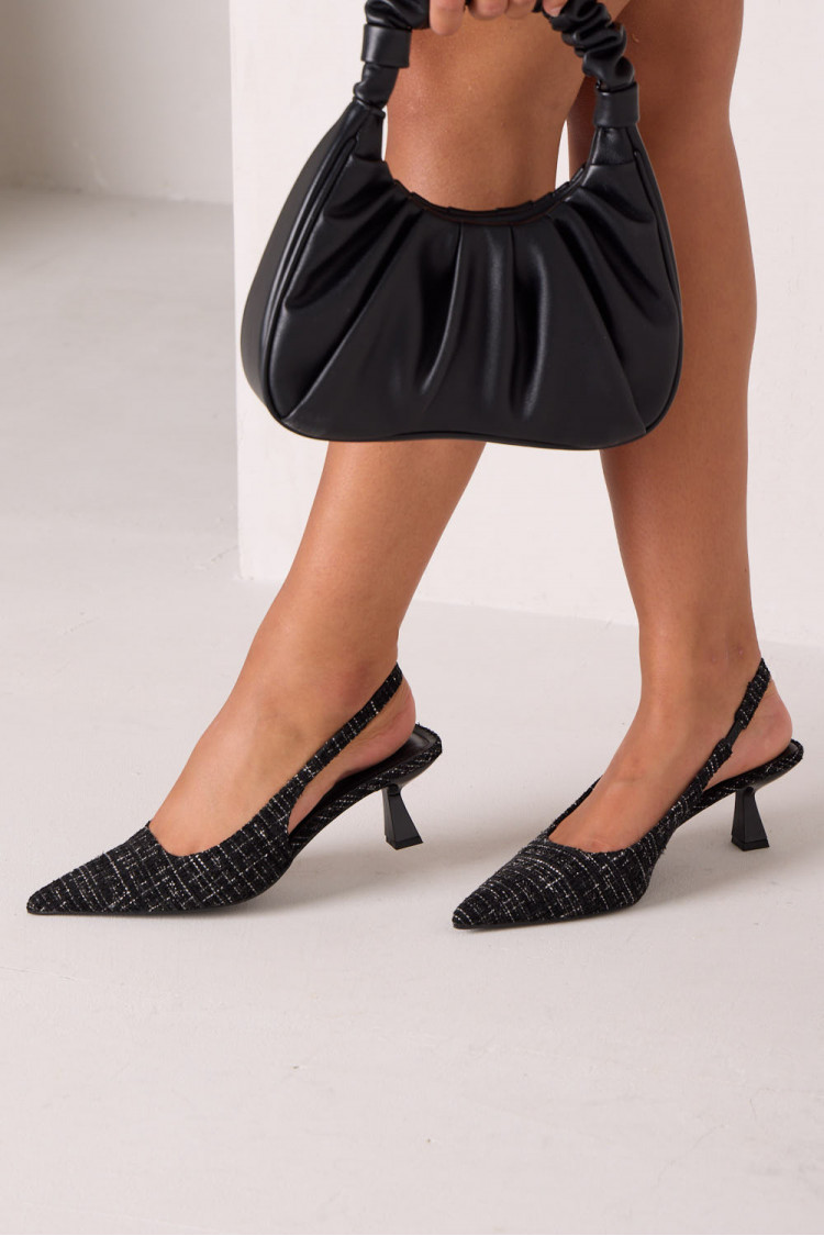 Black fabric heeled mules with checkered pattern